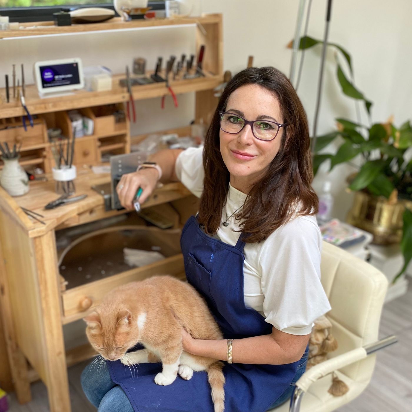 Independent jeweller Croline Brook profile photo at her workbench