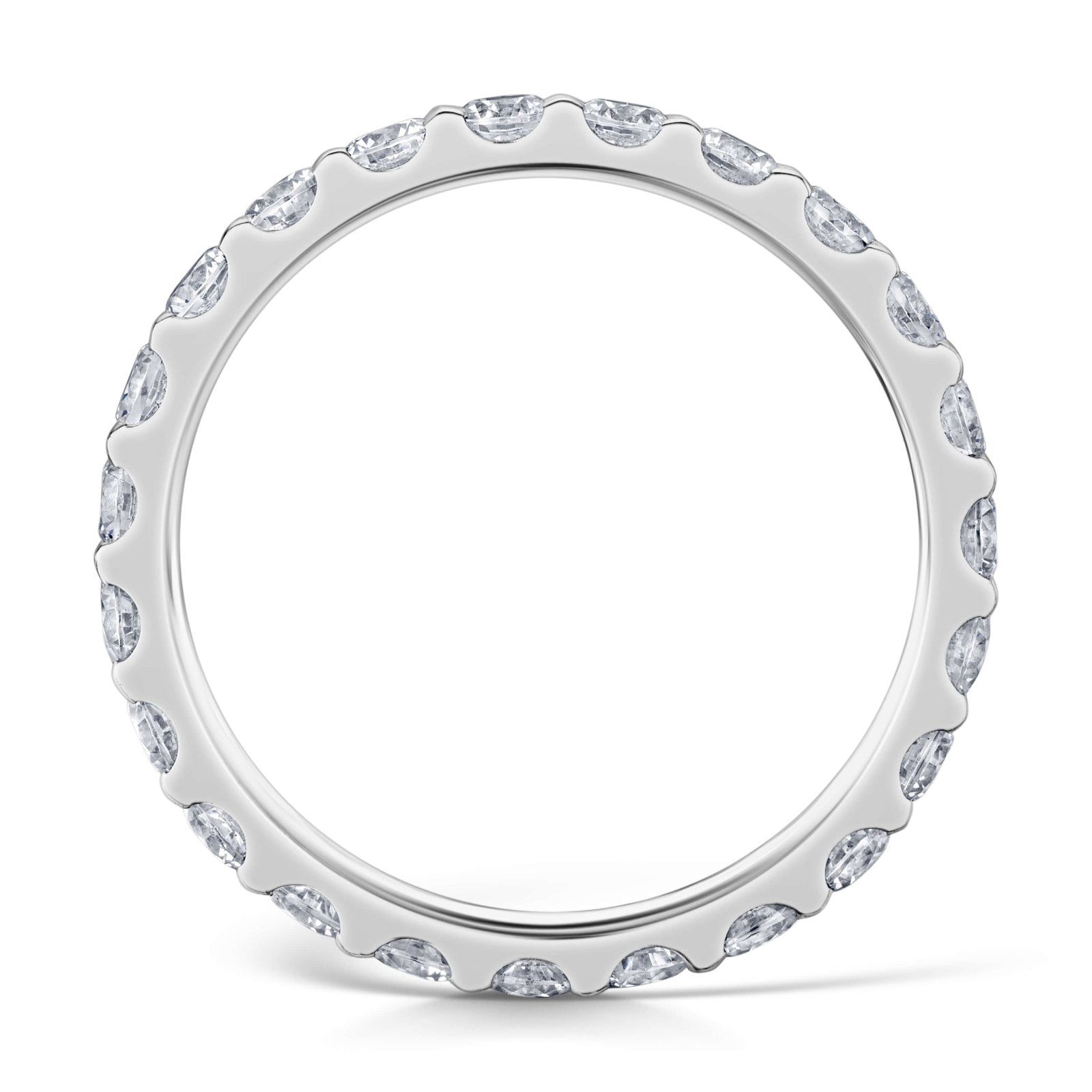 Side view of Round Brilliant cut diamonds set all around a white gold band in a claw style setting.
