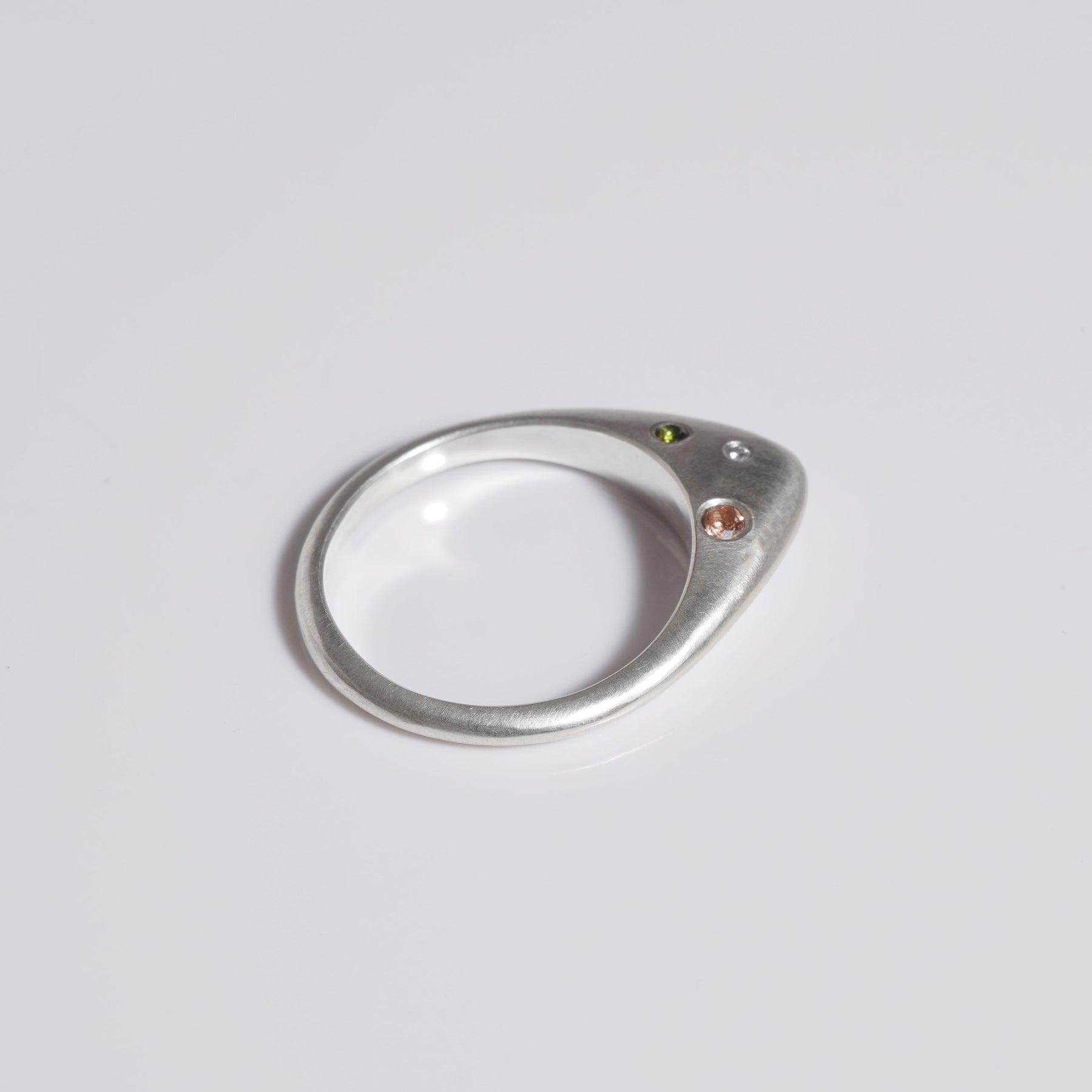 Handmade sterling silver pointed stacking ring with diamonds, andalusite, tourmaline