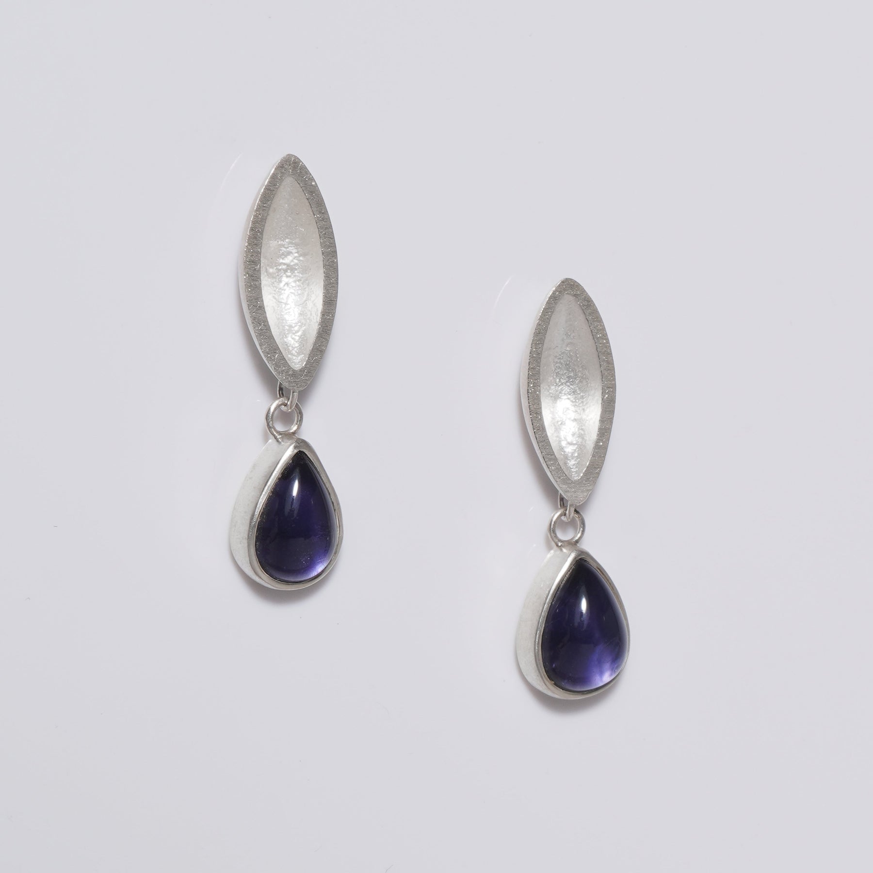 sterling silver sand cast earrings wth iolite stone