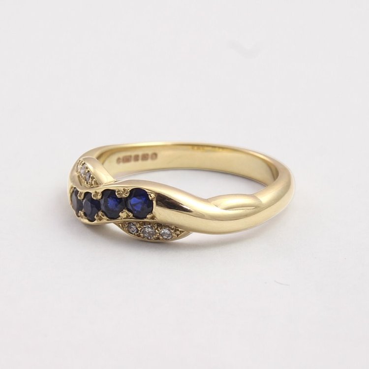 Blue Sapphire and Diamond Twist Ring