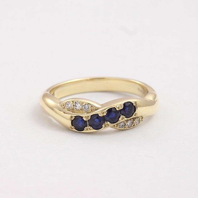 Blue Sapphire and Diamond Twist Ring - Boutee