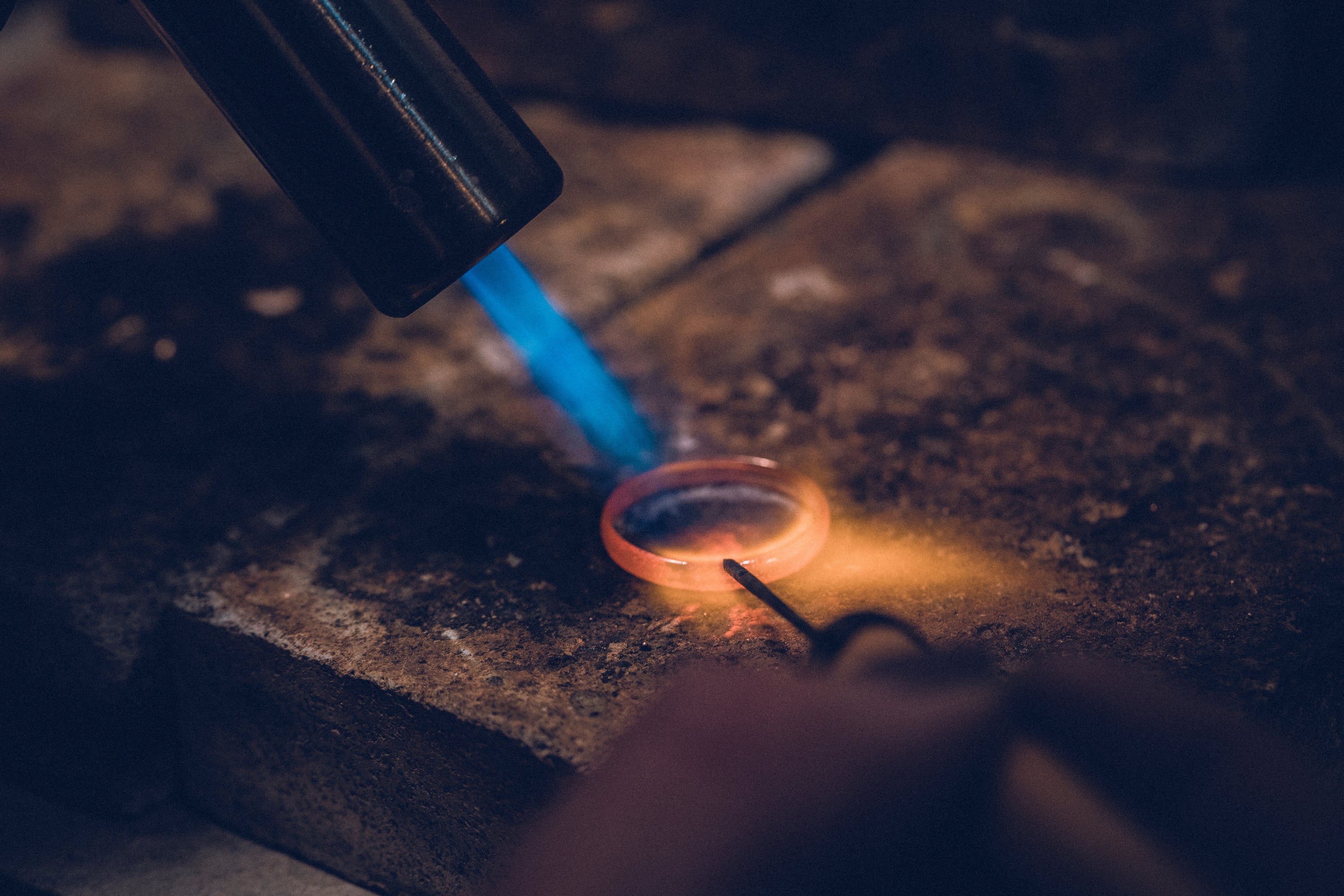 Close up of a bespoke wedding ring being made