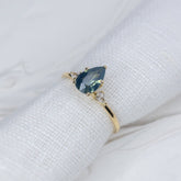 1.13ct Pear Teal Sapphire Gaia Triad Ring - Lelya - bespoke engagement and wedding rings made in Scotland, UK