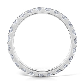 Side view of Round Brilliant cut diamonds set all around a white gold band in a claw style setting.