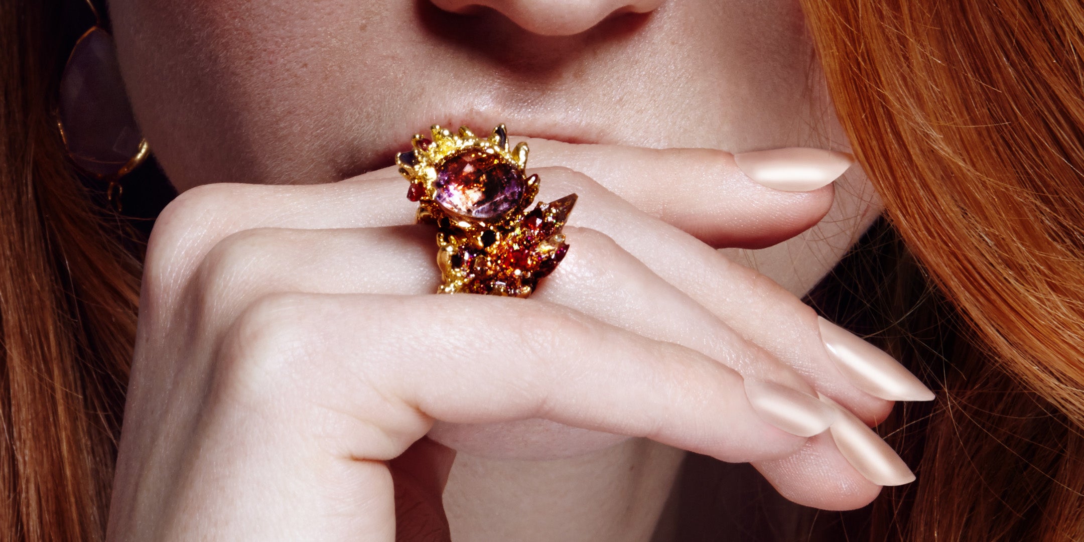 Ginger model wearing a statement ring by independent jeweller Maud Traon