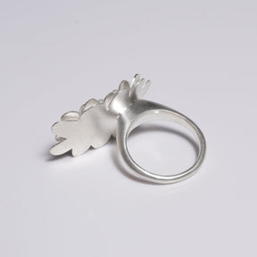 Layered flower sterling silver ring with sapphire set in gold in reverse