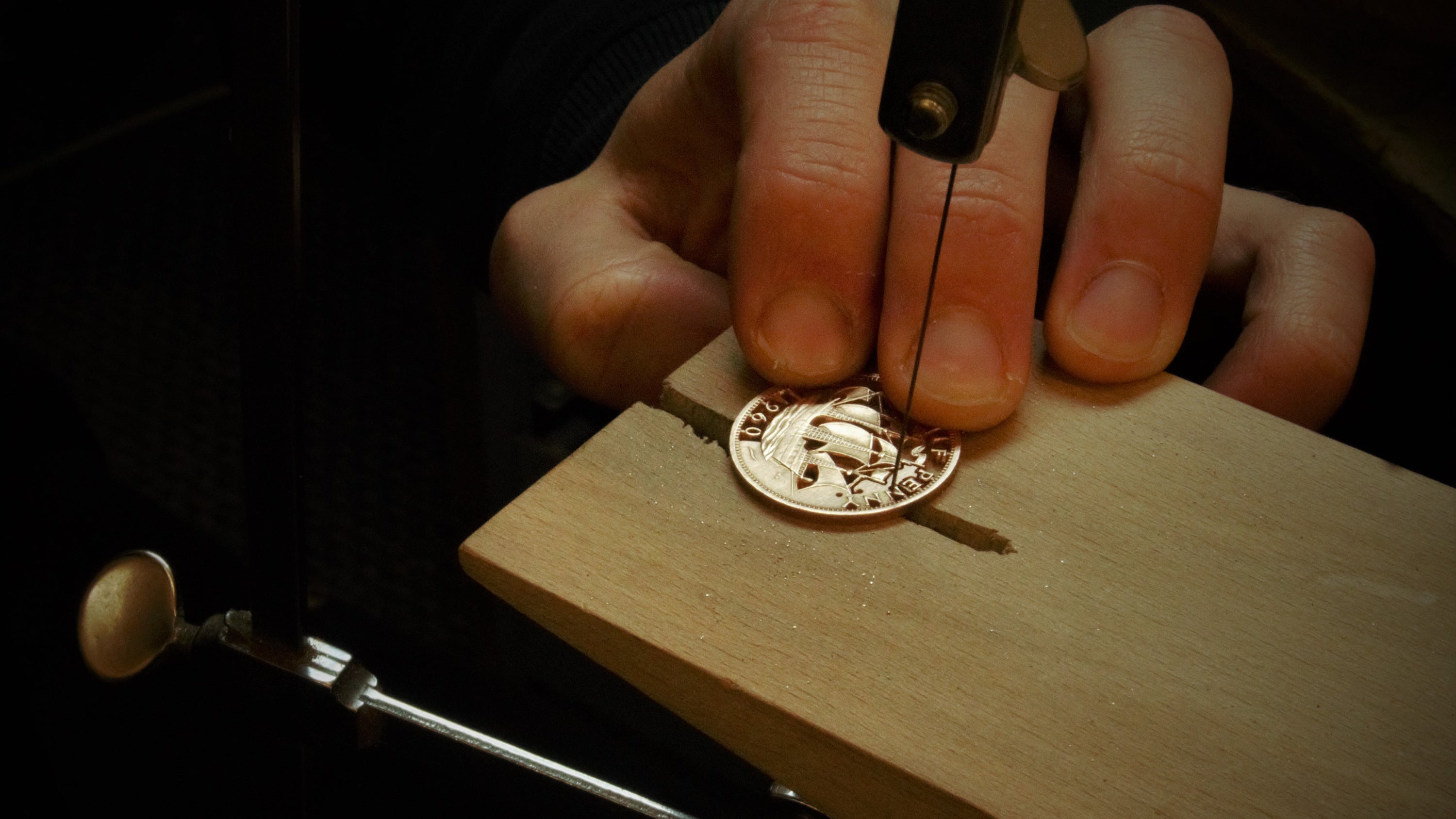 A coin being turned into bespoke bridal jewellery by Coin Design