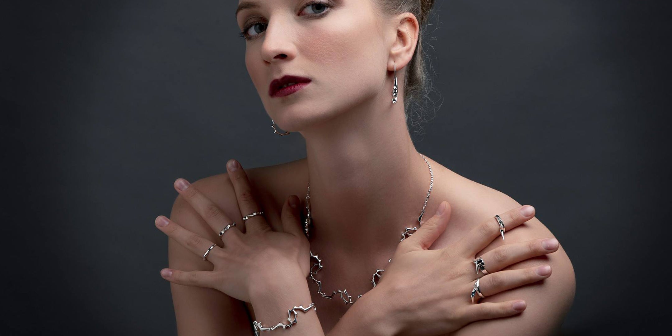 Female model wearing jewellery handmade by Julie Nicaisse