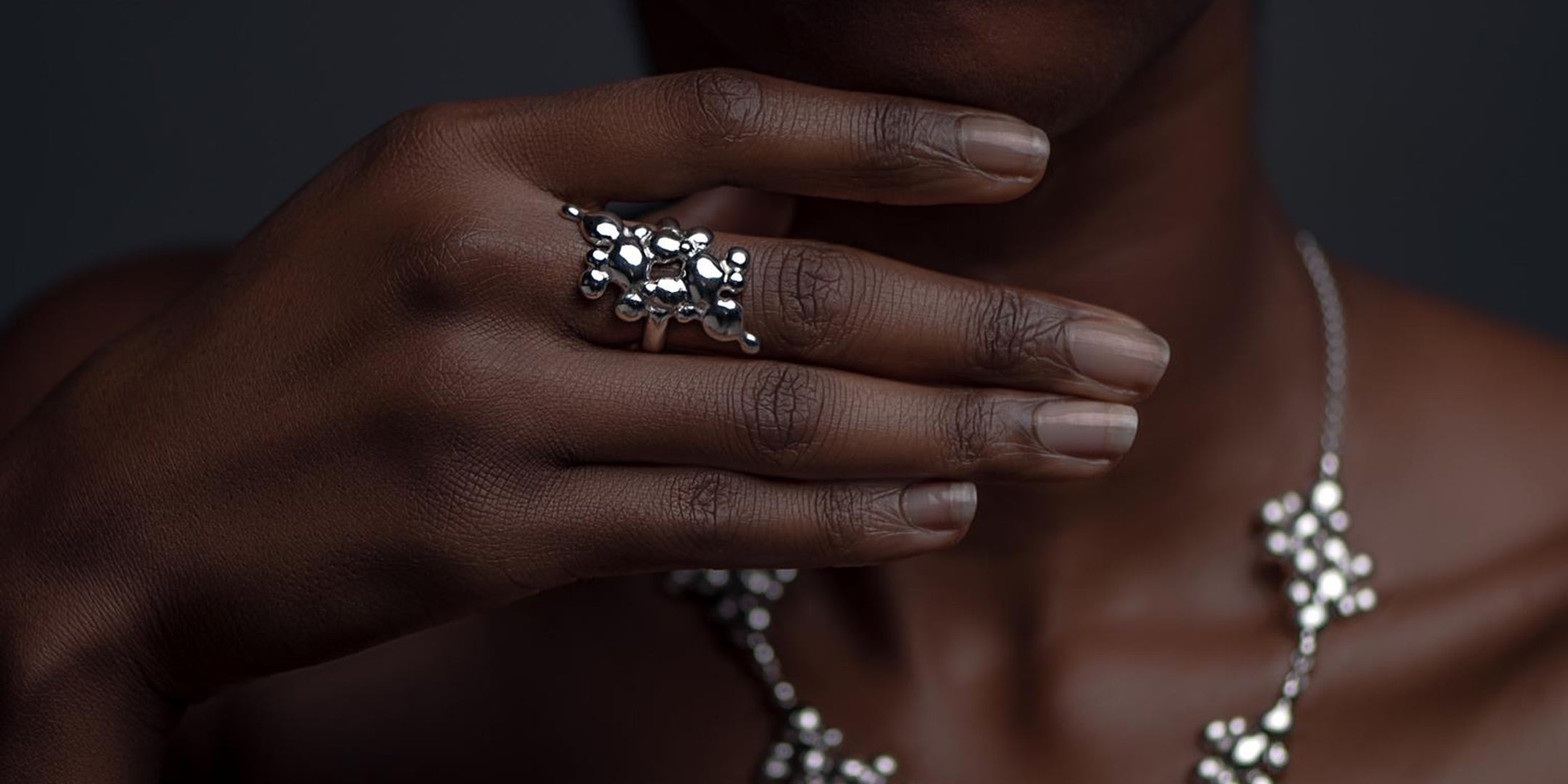 black female model wearing handmade silver jewellery