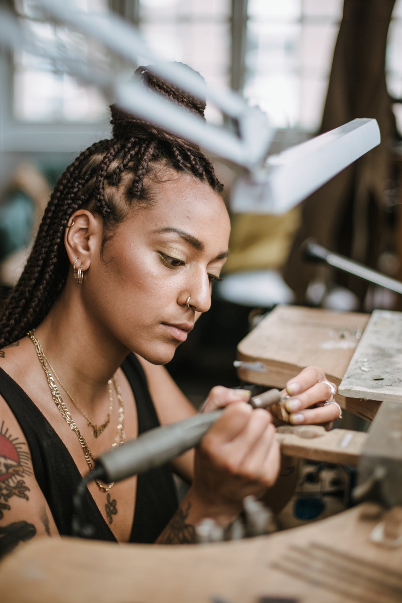 Independent jeweller Halina Mutinta crafting a bespoke engagement ring at her workbench