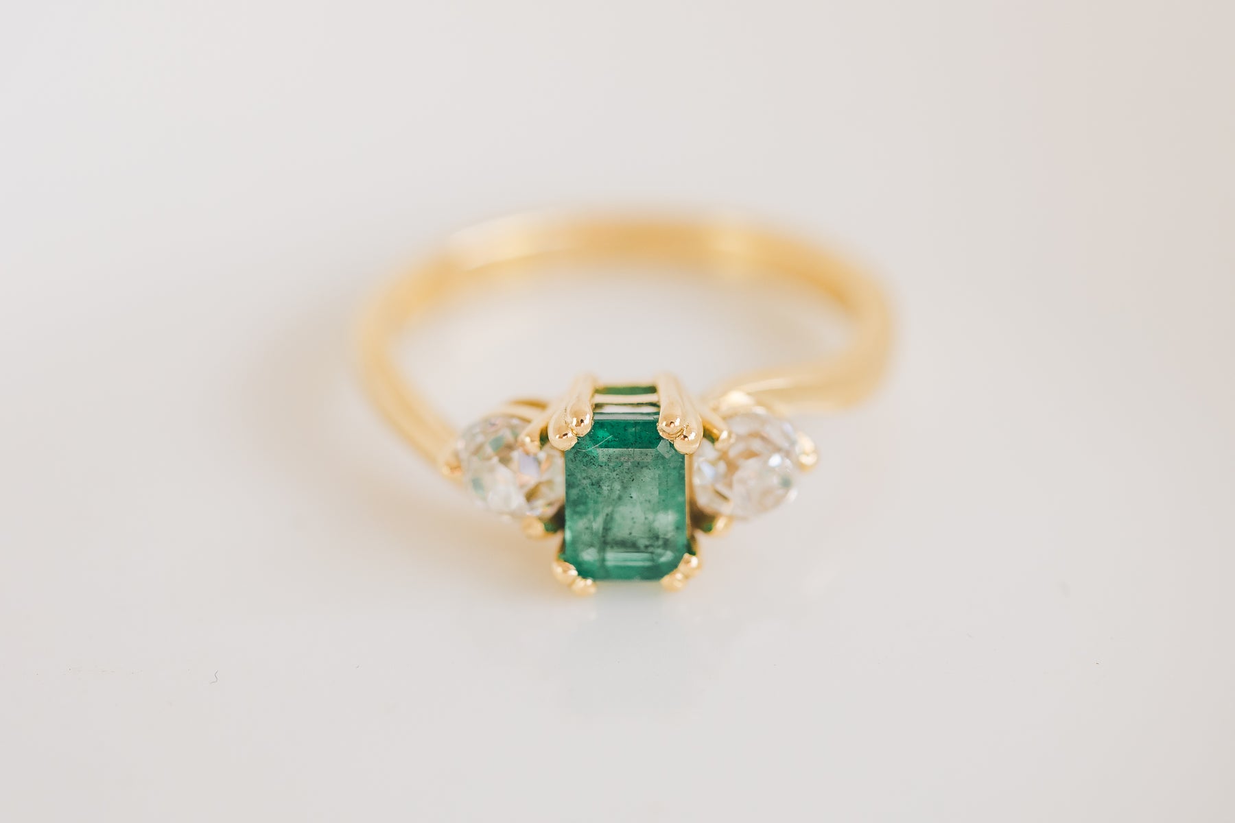 Emerald and Diamond Twist Trilogy Engagement Ring - Boutee