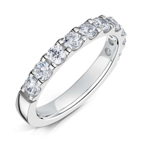 Round Brilliant cut diamonds set half way around a 3.0mm white gold band in a claw style setting on a white background.