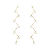 Kinetic Pearl Drop Earrings - Boutee